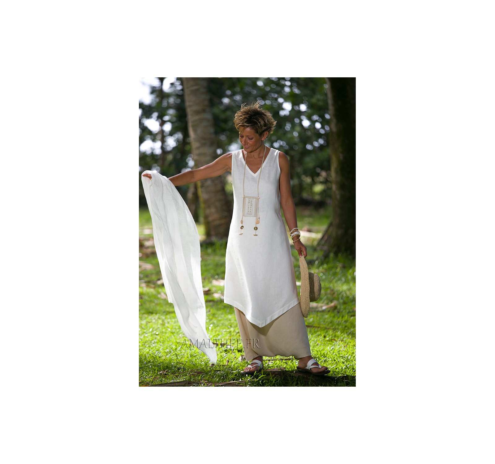 white linen sleeveless summer tunic and beige sarouel skirt