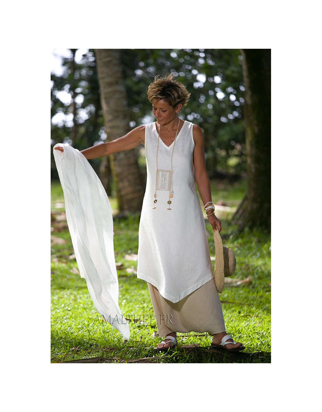 white linen sleeveless summer tunic and beige sarouel skirt