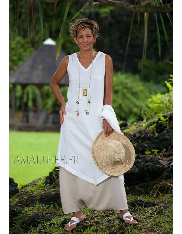 white linen sleeveless summer tunic and beige sarouel skirt