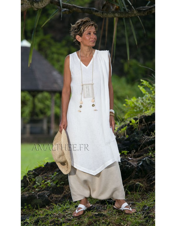 white linen sleeveless summer tunic and beige sarouel skirt