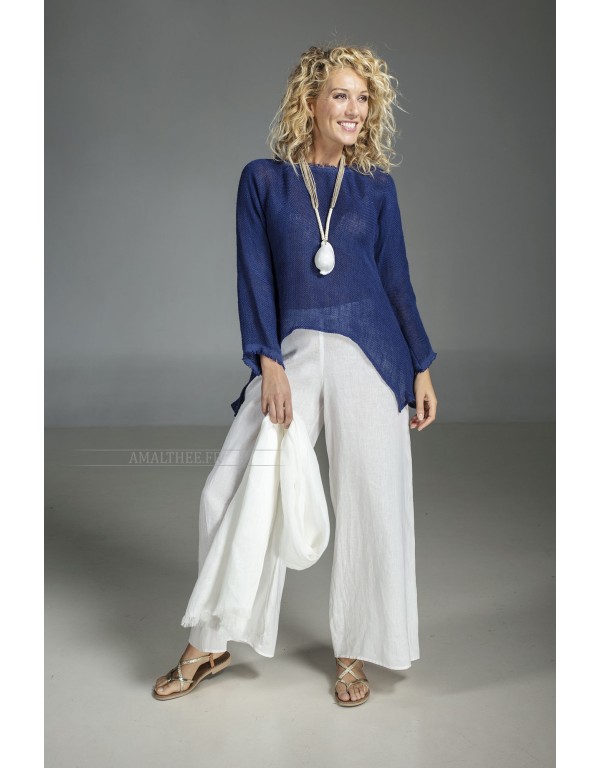 Blue indigo  knit linen top worn over our white linen Baba  pants