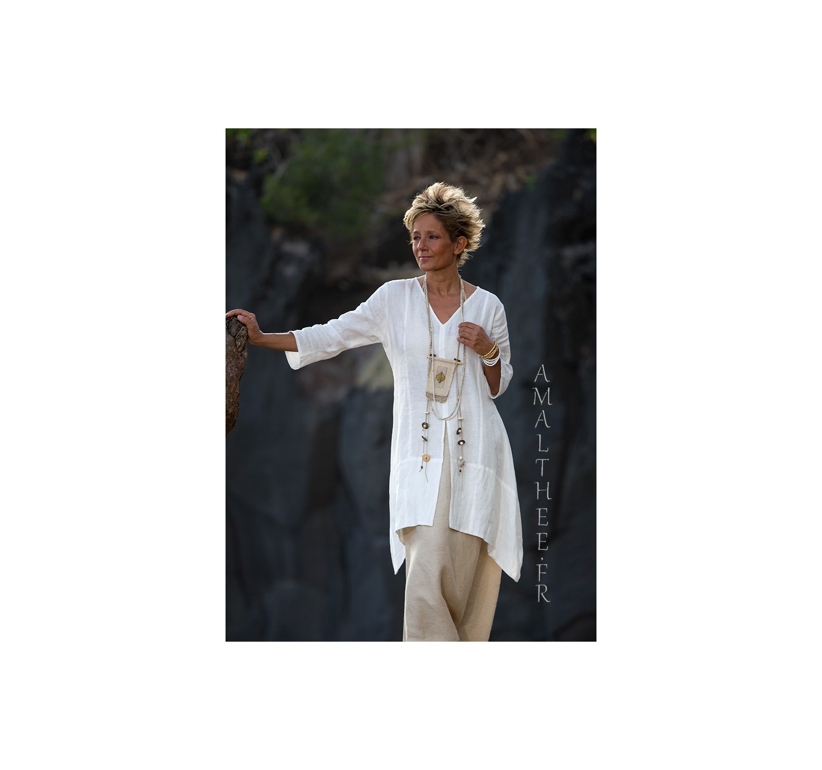 Our natural white linen shirt EmilieTHE must have of this summer!