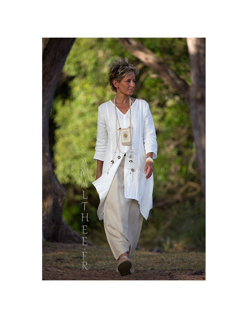 Our natural white linen shirt EmilieTHE must have of this summer!