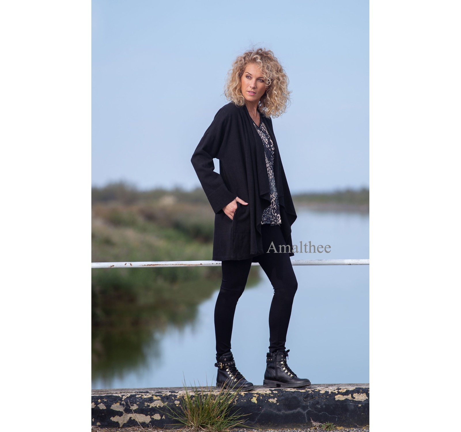 Lise coat in black wool linen with drape on the front with the unstructured Alaya tunic and black jeggings